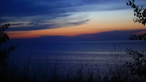 "Serene Sunset Over a Tranquil Lake" Stock Footage 288645367