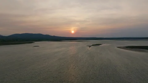 Serene Sunset Over Tranquil Waters Stock Footage 263475972