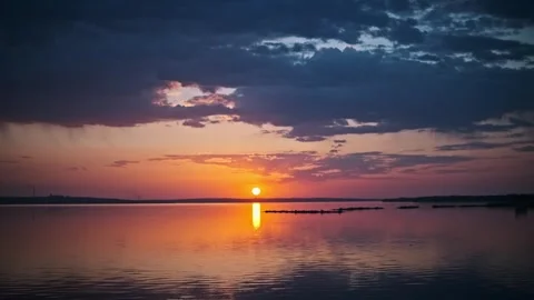 Serene Sunset Reflection Over Calm Lake Waters Stock Footage 307638388