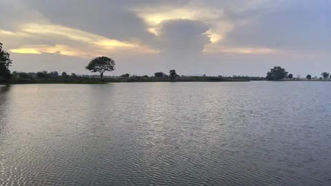 Serene Sunset Reflection Over Calm Lake Nature Scene Tranquil Environment Stock Footage 307817893
