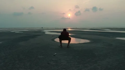 Serene Sunset Timelapse Over Low Tide Beach and Reflection Pools Stock Footage 239223773