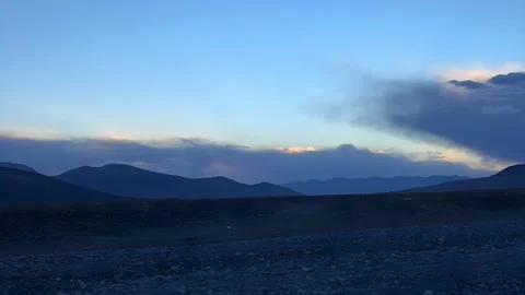 Serene Timelapse: Clouds Soaring Over Vast Tibetan Mountain Landscape Stock-Footage 336069700