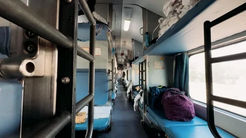  A Serene Train Journey: Capturing the Interior of a Sleeper Coach with Empty Be Stock Footage 335203110
