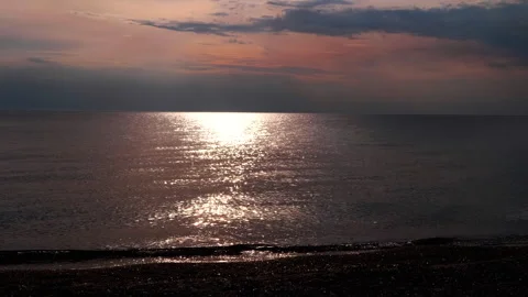 Serene, Tranquil Sunset Reflection on the Beautiful Sea Creates a Calm Stock Footage 312015675