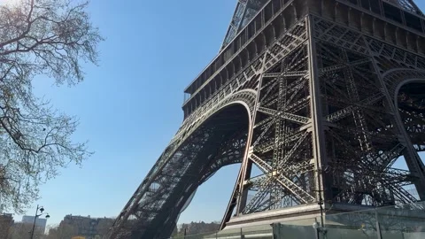 Serene urban scene featuring Eiffel Tower early morning illumination Stock Footage 337184382