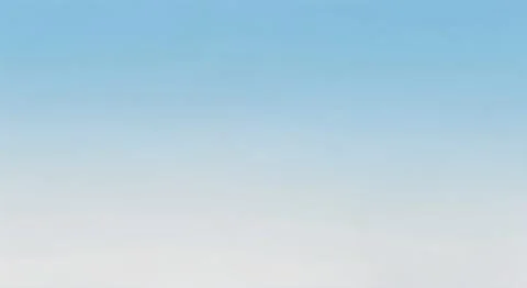 A serene view of the clear blue sky with a soft gradient transitioning into.. Stock Illustration