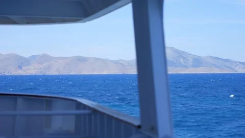 A serene view from a ship deck looking out to the calm waters of the Aegean.. Stock Footage 292123416