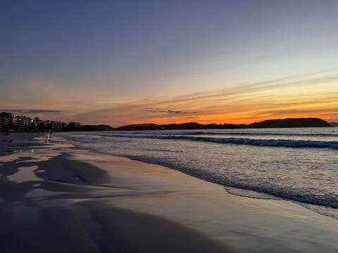 Serene view of sunset beach Stock Photos