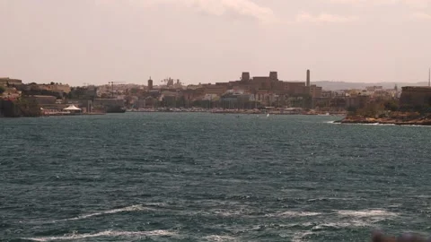 Serene waterfront cityscape of Valetta in Malta with urban buildings and water Vídeos de archivo 343876232