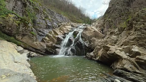 Serene Winter-to-Spring Waterfall - Static 4K Nature for Focus &amp; Soulful Zen Video stock 332145891