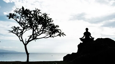 Serenity and yoga practicing Stock Footage 129322625
