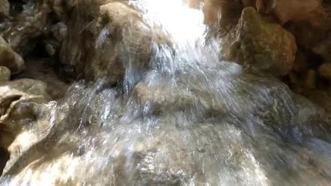 The Serenity of a Hidden Waterfall Stock Footage 331265774