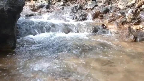 The Serenity of a Rocky River Stream Stock Footage 332155981