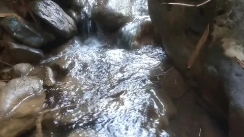 The Serenity of a Rocky River Stream 스톡 동영상 335061761