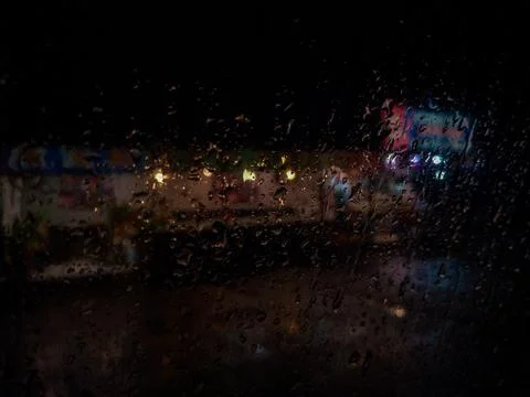 Serenity in the Storm: Capturing Rain Drops on a Window Stock Photos