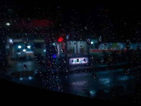 Serenity in the Storm: Capturing Rain Drops on a Window Stock Photos