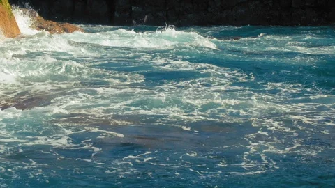 Serf on the sea cost. Waves of the ocean beat against the coastal fortifications Stock Footage 120108170