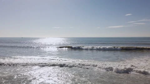 Serfists in the sea between the waves Stock Footage 222013900