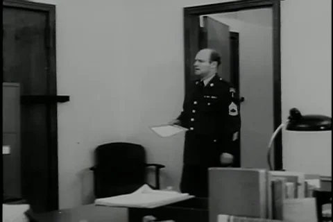 Sergeant locks the classified information document in a safe lock - 1969 Stock Footage 105743380