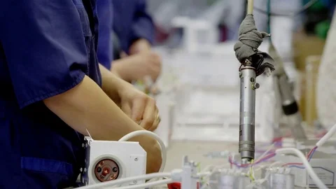 Serial assembly production. Coil assembly. Factory production Stock Footage 78335808