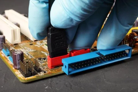 Serial ata connection of cable with computer motherboard, selective focus Stock Photos