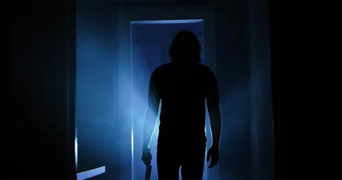 Serial Killer w/ Knife Walking Down Creepy Old Hallway Slow Motion 4k Video stock 161601915