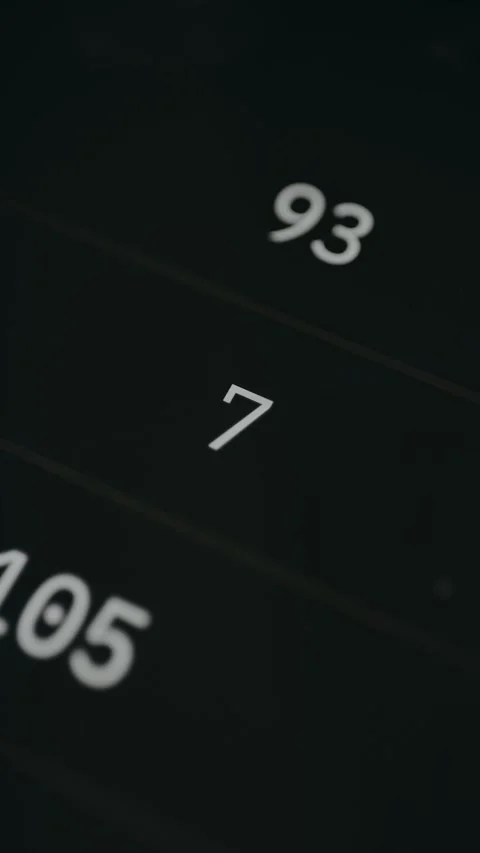 A series of changing numerical values on a black background Stock Footage 332936327