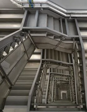 A series of nested, metallic frames. The cool, industrial palette is define.. Stock Photos