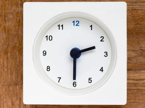 Series of the sequence of time on the simple white analog clock , 11/48 Stock Photos
