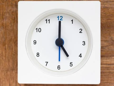 Series of the sequence of time on the simple white analog clock , 21/48 Stock Photos
