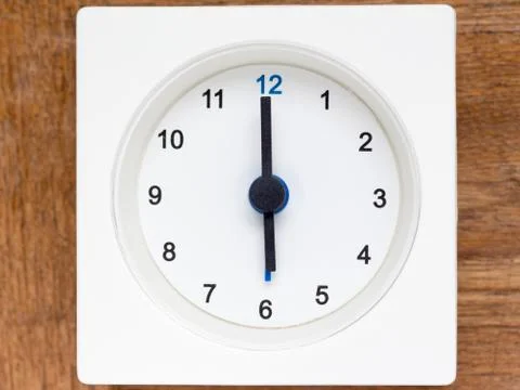 Series of the sequence of time on the simple white analog clock , 25/48 Stock Photos