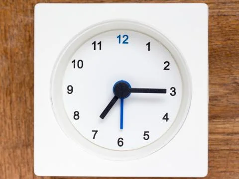 Series of the sequence of time on the simple white analog clock , 30/48 Stock Photos