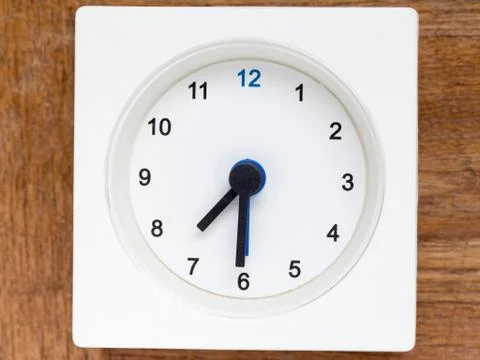 Series of the sequence of time on the simple white analog clock , 31/48 Stock Photos