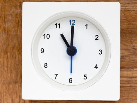 Series of the sequence of time on the simple white analog clock , 45/48 Stock Photos