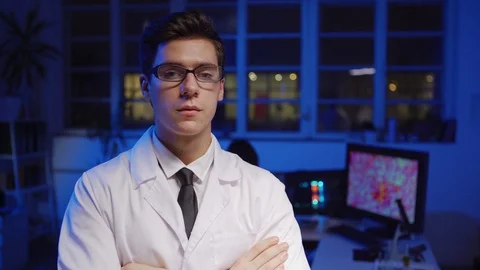 Serious and confident scientist posing in laboratory Stock Footage 124715713