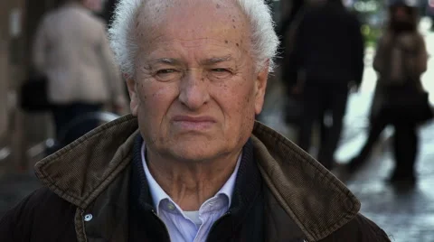 Serious and sad old man in the city: pensive retired elder caucasian man  Stock-Footage 58302486