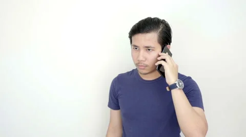 Serious Asian Man Calling With Smartphone On Studio White Background Slow Mot Stock Footage 59949201
