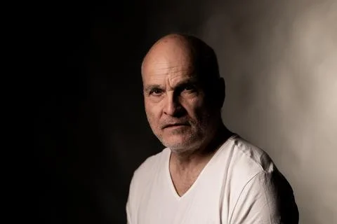 Serious bald man making a dramatic portrait Stock Photos