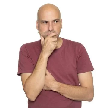 Serious bald man thinking looking aside Stock Photos