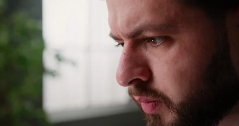 Serious bearded man working, reading information, looking thoughtful. Portrait Stock-Footage 151347856
