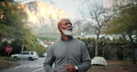 Serious, black man and running in nature for fitness, exercise and retirement Stock Footage 340883433