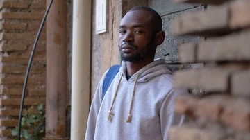 Serious black migrant stares at the camera Stock Footage 85836161