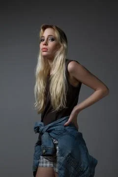 Serious blonde looking at camera Stock Photos