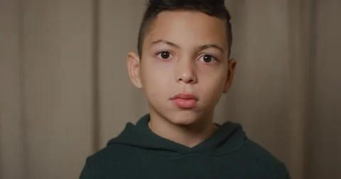 Serious boy looking at the camera Stock Footage 104105574