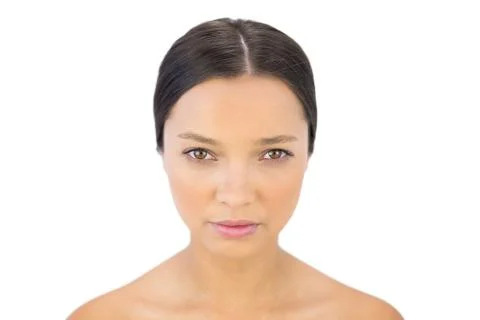 Serious brunette looking at camera Stock Photos