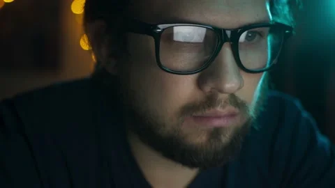 Serious businessman using laptop for analyzing data stock market, graph. Video stock 147393892