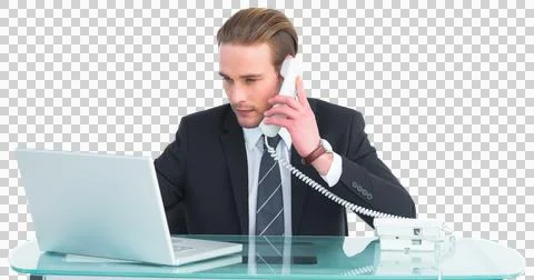 Serious businessman using laptop while phoning Stock Photos