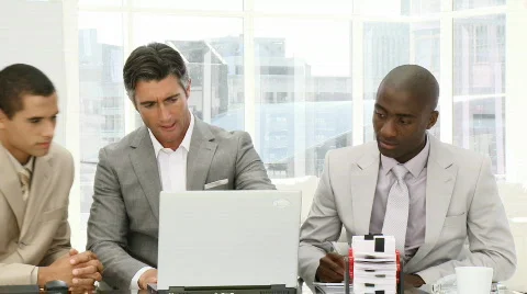 Serious businessmen working at a computer 스톡 동영상 617522