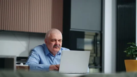 Serious Busy Aged Man Working With Laptop At Home, Portrait Of Male Person With Stock Footage 237075166