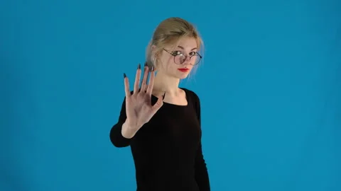 Serious combines gestures and words to make interlocutor stop Stock Footage 290939031